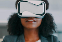 Photo: Woman wearing virtual reality (VR) headset 