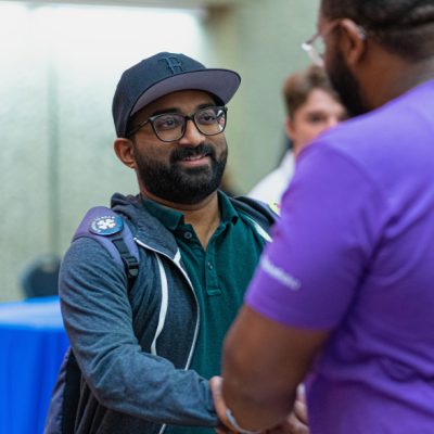 Student shaking hand with a recruiter