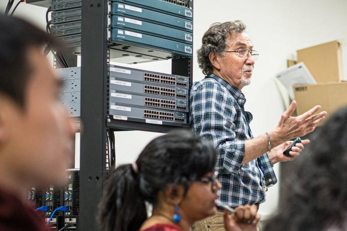 A professor giving lecture on information security
