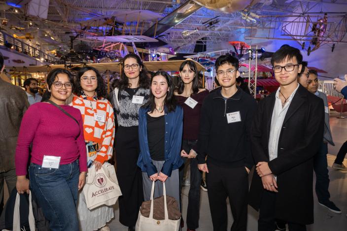 Manning College of Information and Computer Sciences alumni and students at an event