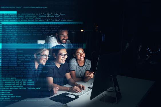 A group of students working on a coding project
