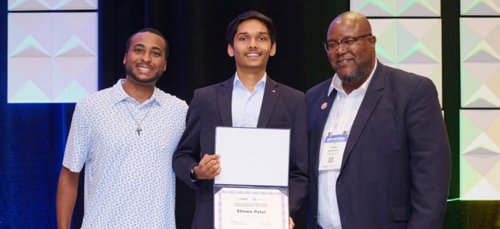 Shiven Patel pictured with Tapia 2024 conference leaders as he accepts award