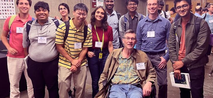 Andy Barto, Scott Neikum pose with current students
