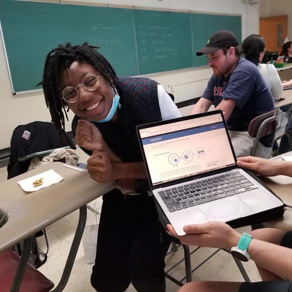 Eli Boahen ’24MS in Trim’s classroom