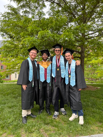 From left: Max Loper, Rishi Nandurbarkar, Flo Sabatini, and Ben Hyjek at their 2025 graduation from UMass Amherst.