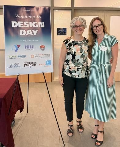 Emily Nutwell, left, director of experiential learning & PIT Pathways at UMass Amherst, and Carolina Rossini, director of public interest technology (PIT) programs at UMass, pose for a photo at the July 16 Ignition event.