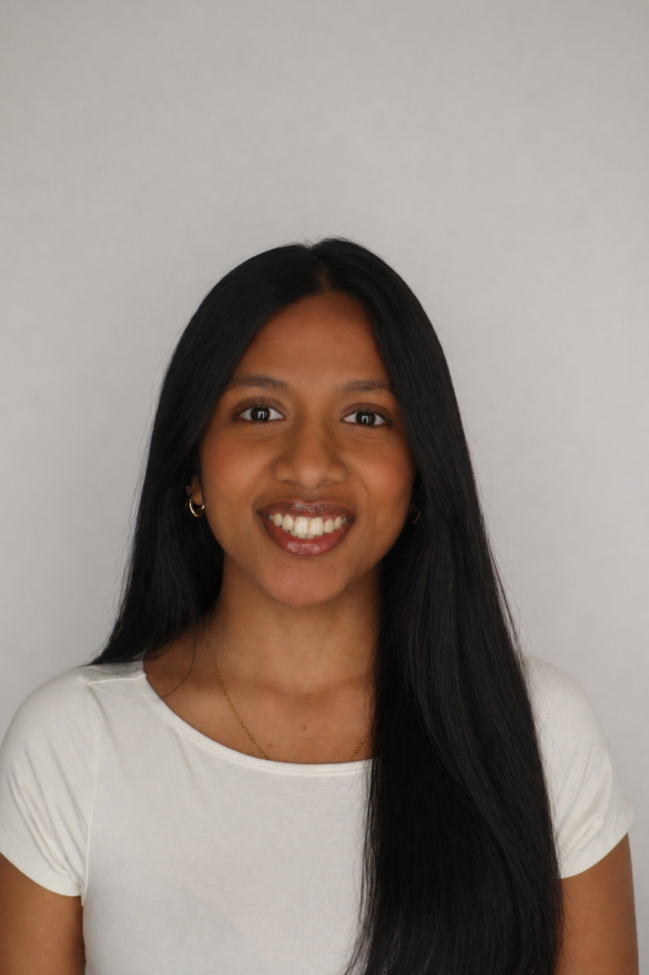 headshot of a woman with a white shirt