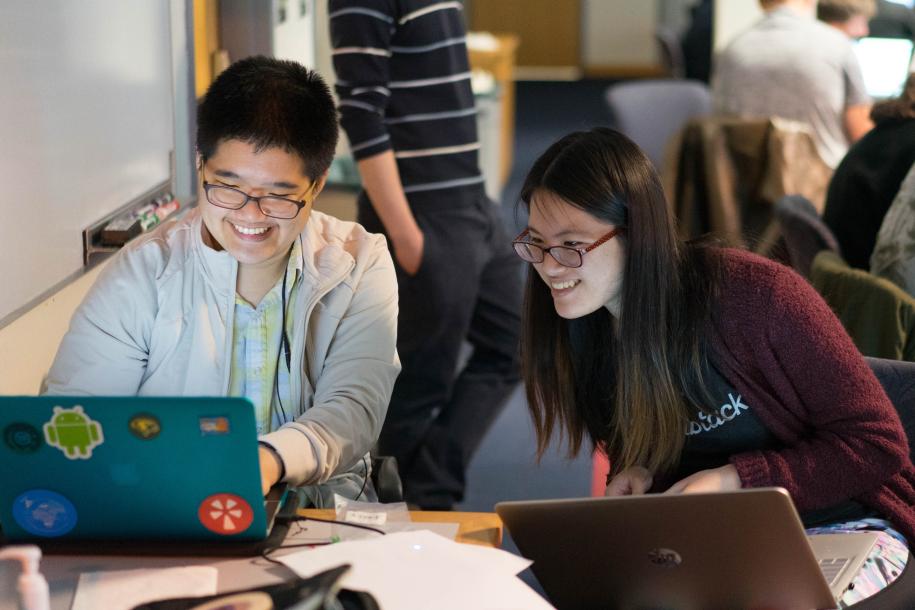 Two female students working together on a project