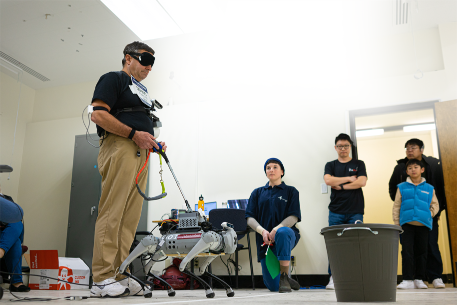 Blindfolded participate tests robot guide dog