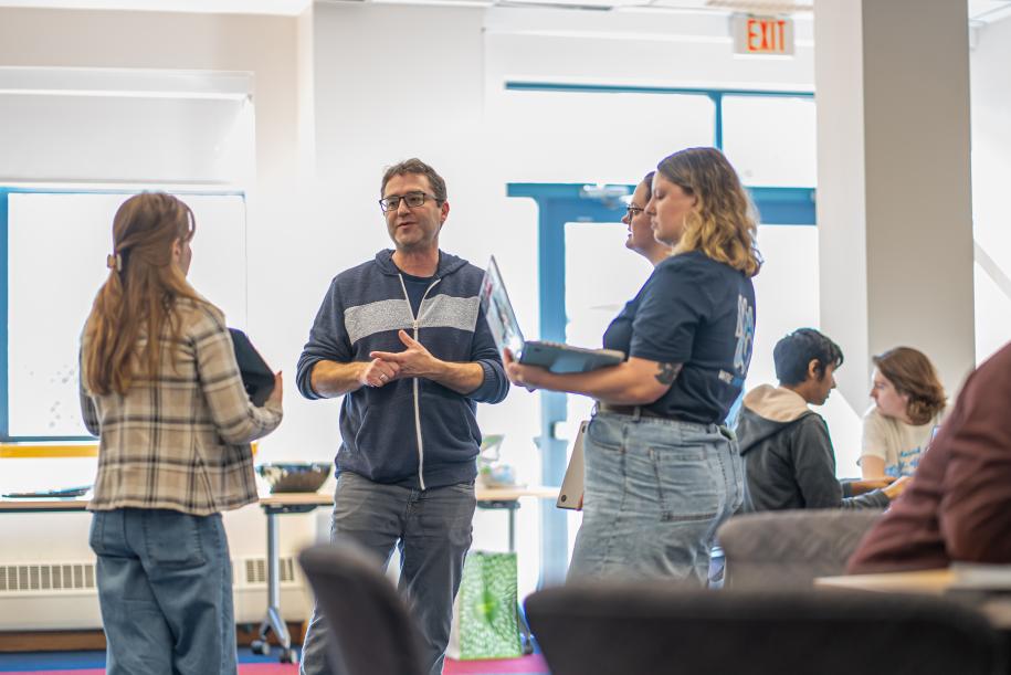 Brian Levine with participants at the 2024 Cybersecurity Hackathon